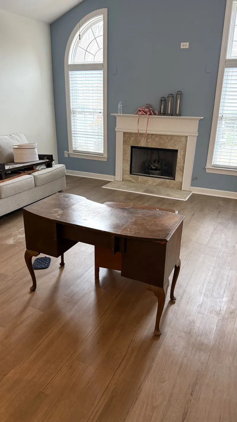 Living room with fireplace after cleaning